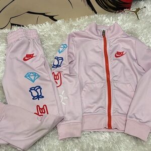 Nike Light Pink Tracksuit with Red and Blue Graphics